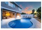 Sunset Comfort Awaits with AMI Rentals with Private Spa Heated Pools