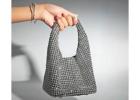 Capture Bold Sophistication with a Statement Bag Look