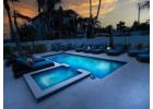 Sunset Comfort Awaits with AMI Rentals with Private Spa Heated Pools